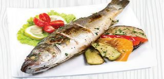 Spigola con patate al forno