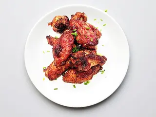 Alette di pollo e cosce