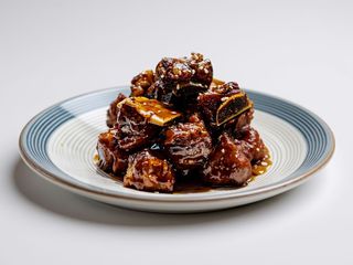 Costine di maiale caramellate 糖醋排骨