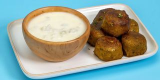 Polpette con fonduta di zola