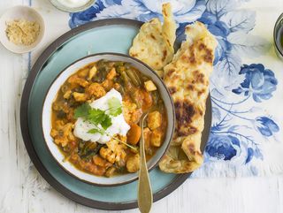 Pollo al curry e roti