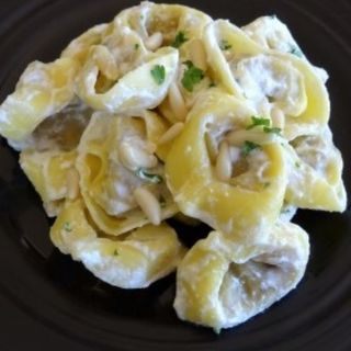 Tortelloni con crema di funghi