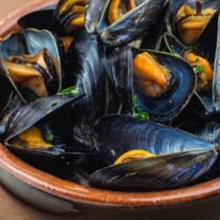 Impepata di cozze al sugo 