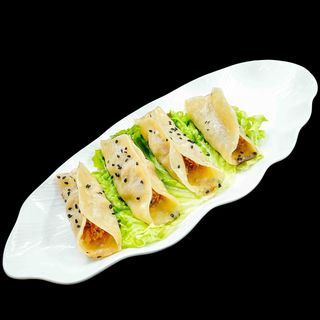 Ravioli di maiale alla piastra 4 pezzi