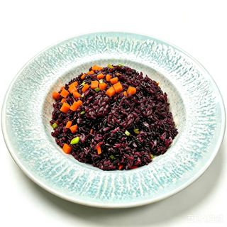 RISO NERO SALTATO CON VERDURE