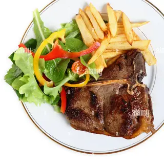 Piatto composto(Costata di manzo+insalata verde+patatine fritte)
