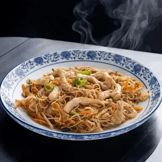Spaghetti di riso con pollo