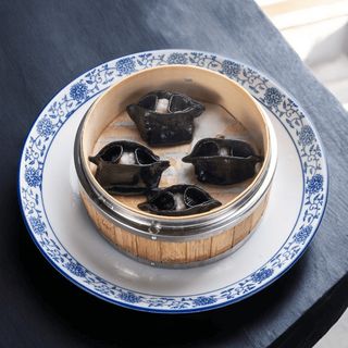 Ravioli al vapore con calamari