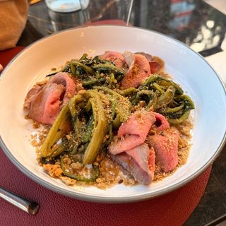 Carpaccio di scottona C.B.T. cicoriella spadellate e tarallo sbriciolato