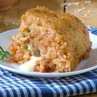 Riso al forno con piselli e macinato