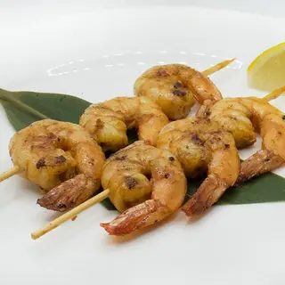 Spiedini di gamberi alla griglia