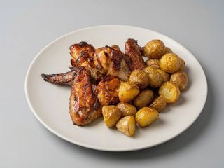 Alette di pollo al forno con patate