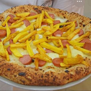 Würstel e patate al forno