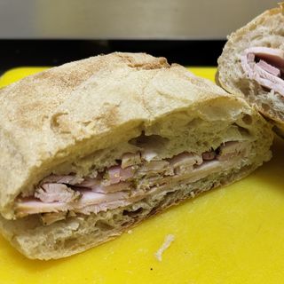 Porchetta di tacchino con squacquerone e rucola