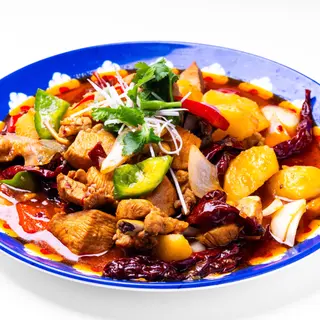 Pollo stufato con patate piccante大盘鸡