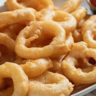 Anelli di cipolla pastellati