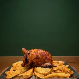 Pollo allo spiedo con aggiunte di patate