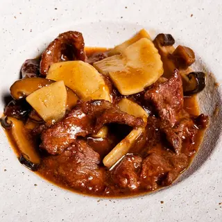 Manzo con bambù e funghi shiitake