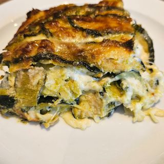 Parmigiana di zucchine e speck