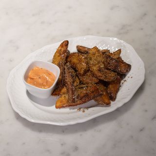 Patate fritte, parmigiano e tartufo