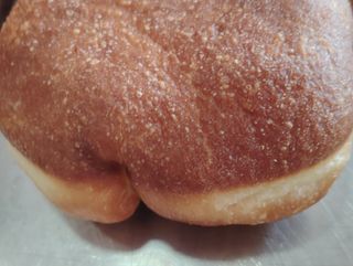 Bomba fritta con prosciutto e mozzarella