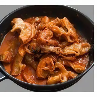 Intestino di maiale in padella piccante