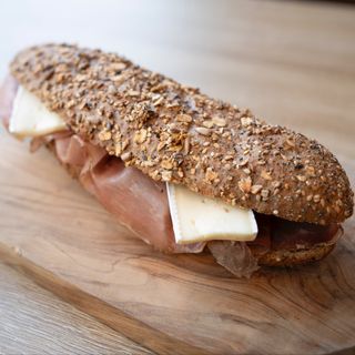 Ciabattina multicereali speck, brie, paté olive taggiasche