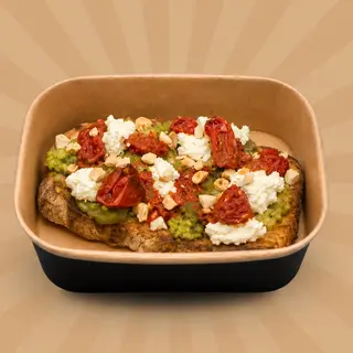 Crostino gourmet  con crema di zucchine, pomodorini arrosto ricotta e mandorle