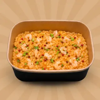 Risotto con fumetto di crostacei, battuta di gamberi e guanciale croccante
