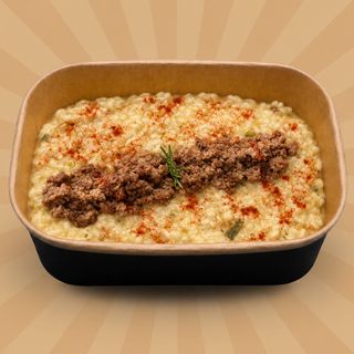 Risotto con ragù di cinghiale, porri stufati e paprica affumicata