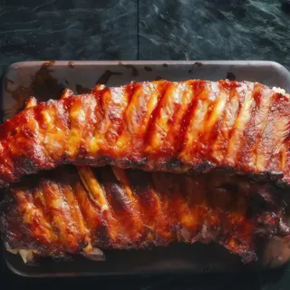 RIBS DI MAIALE COTTO ALLA BIRRA