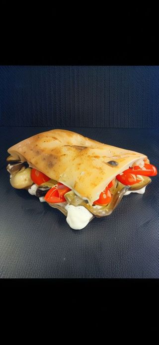 13 Stracciatella di burrata melanzane,pomodorino e origano