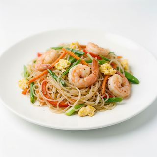 Spaghetti di riso con gamberi e verdure