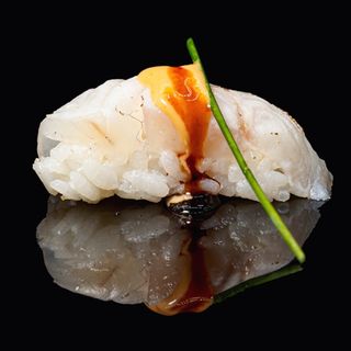48.Branzino flambe