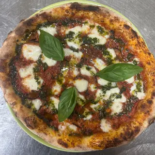 Pizza con parmigiana di melanzane