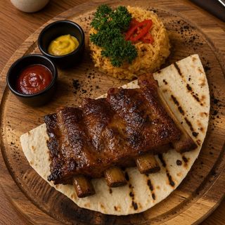 Costine di maiale con crauti e salsa agrodolce
