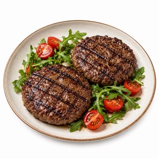 Hamburger di marchigiana con rucola e pomodorini