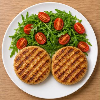 Hamburger di pollo con rucola e pomodorini
