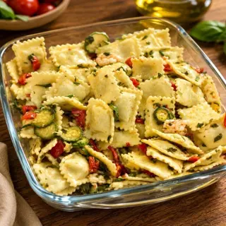 Ravioli di pesce con dadolata di gamberoni e zucchini