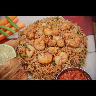Seafood Deluxe Fried Rice paired with a soda