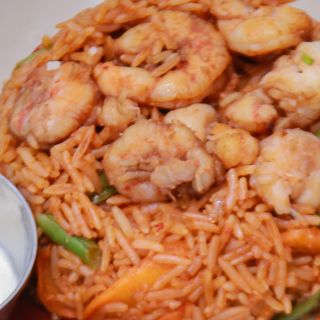 Seafood Deluxe Fried Rice paired with a soda