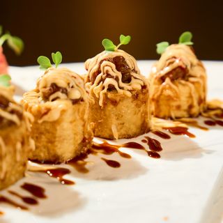 Spicy Salmon Tuna Volcano Roll