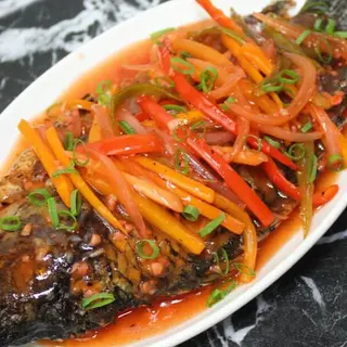 Small-size fish wet fry with rice and greens