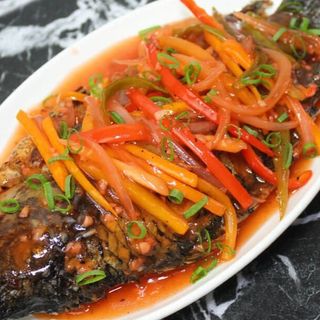 Small-size fish wet fry with rice and greens