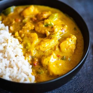 Coconut fish curry served with coconut rice 