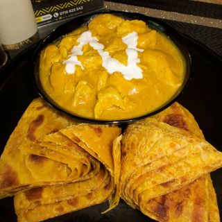 Coconut fish curry served with 2 chapatis 