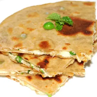 One Paneer Paratha - Tandoori with Plain Curd (Stuffed Cottage Cheese Naan served with Plain Yogurt)