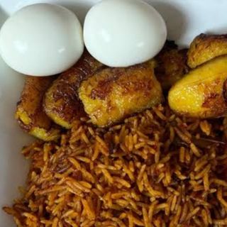 Jollof rice, plantains and 2 boiled eggs 