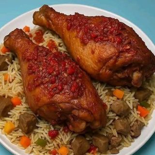 Fried Rice mixed with beef cubes and 2 drumsticks