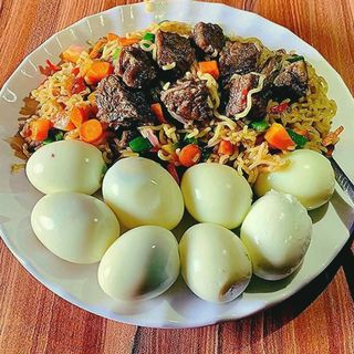 Vegetables Noodles mixed with spicy beef cubes and 8 boiled eggs